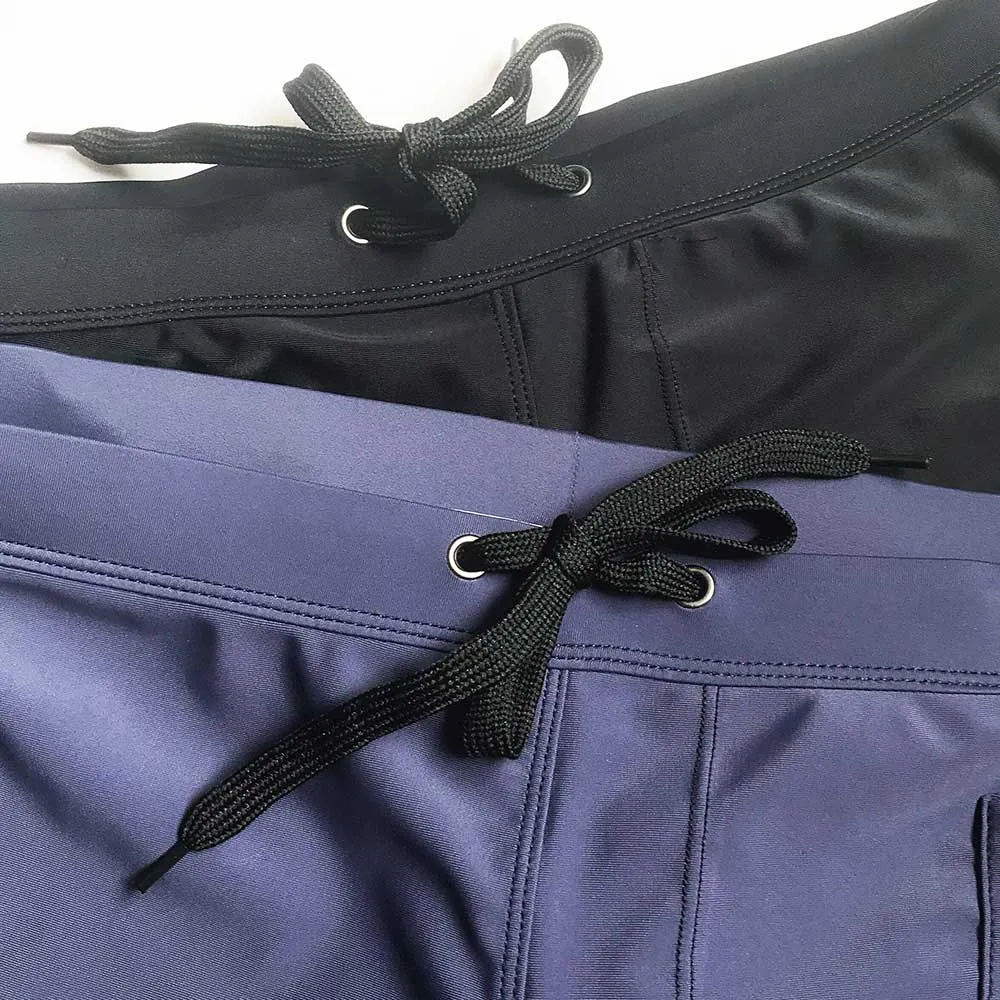 Bold Vert Pocketed Swim Trunks